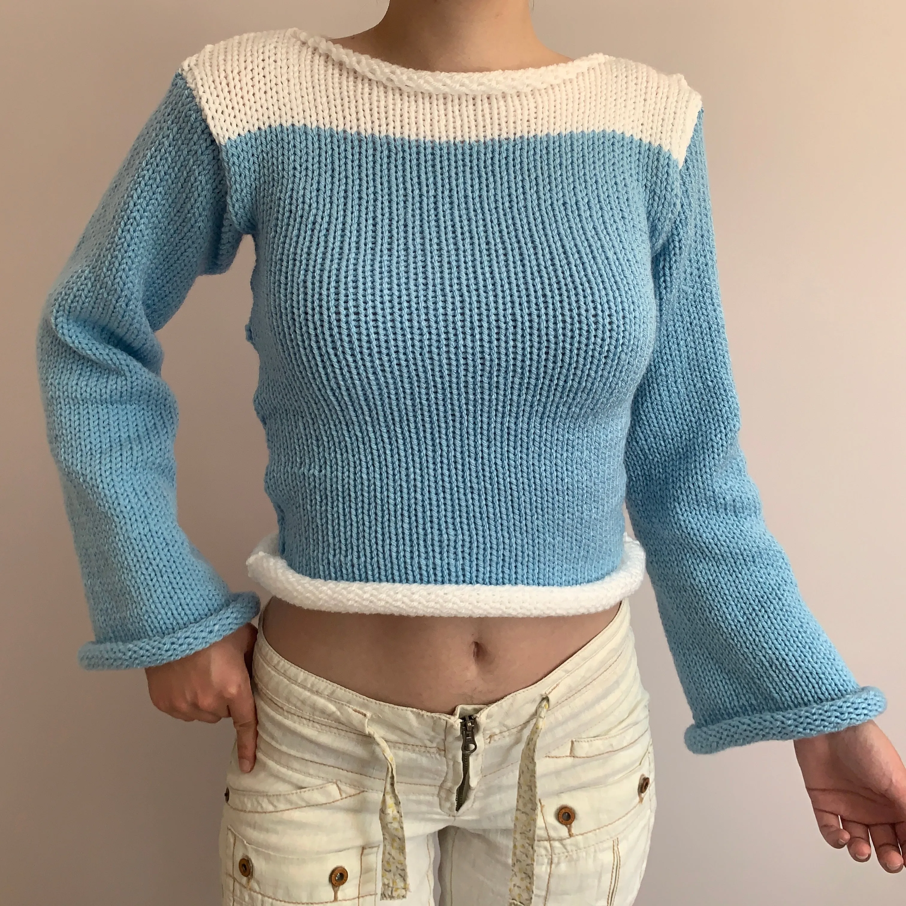 Handmade knitted colour block jumper in baby blue and white