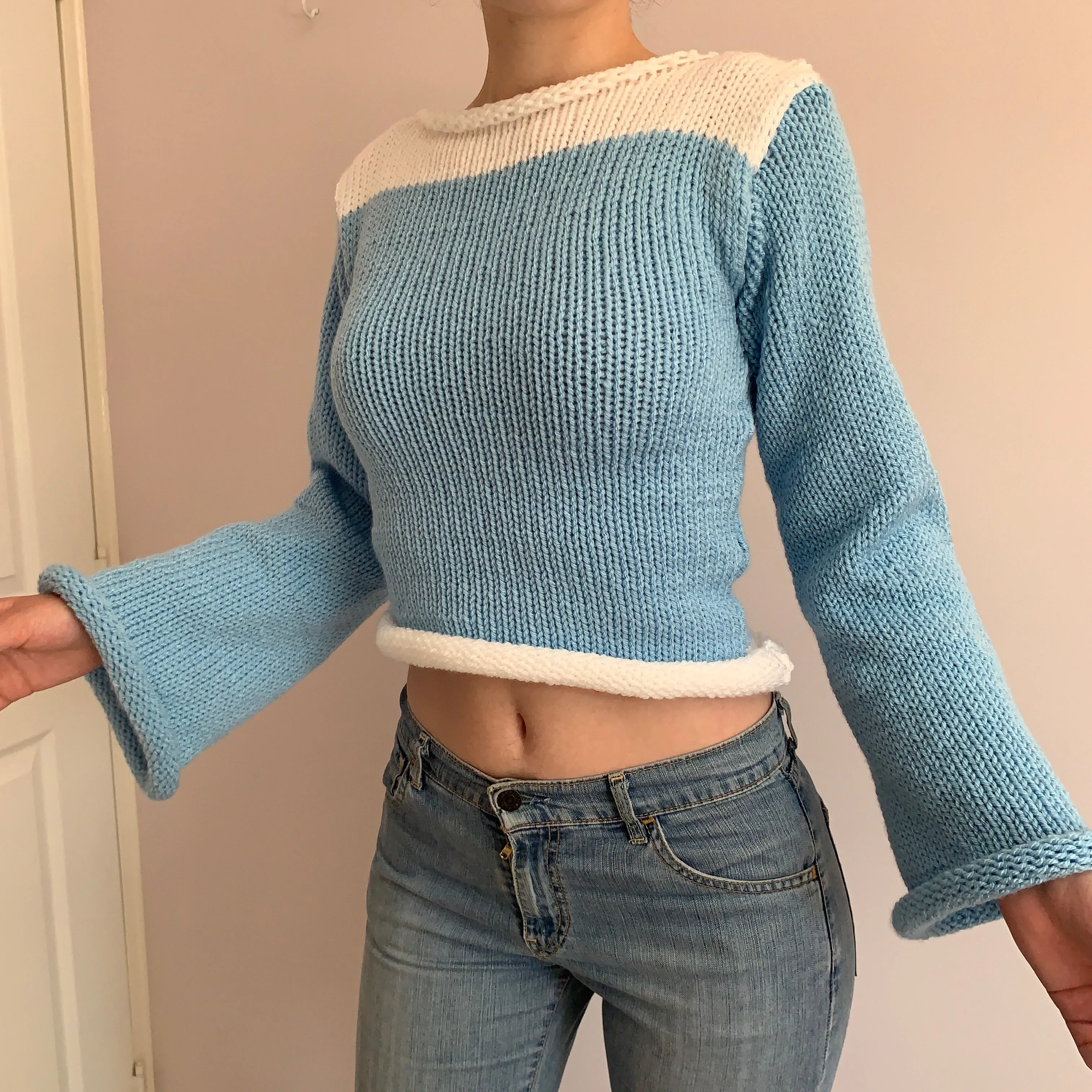 Handmade knitted colour block jumper in baby blue and white