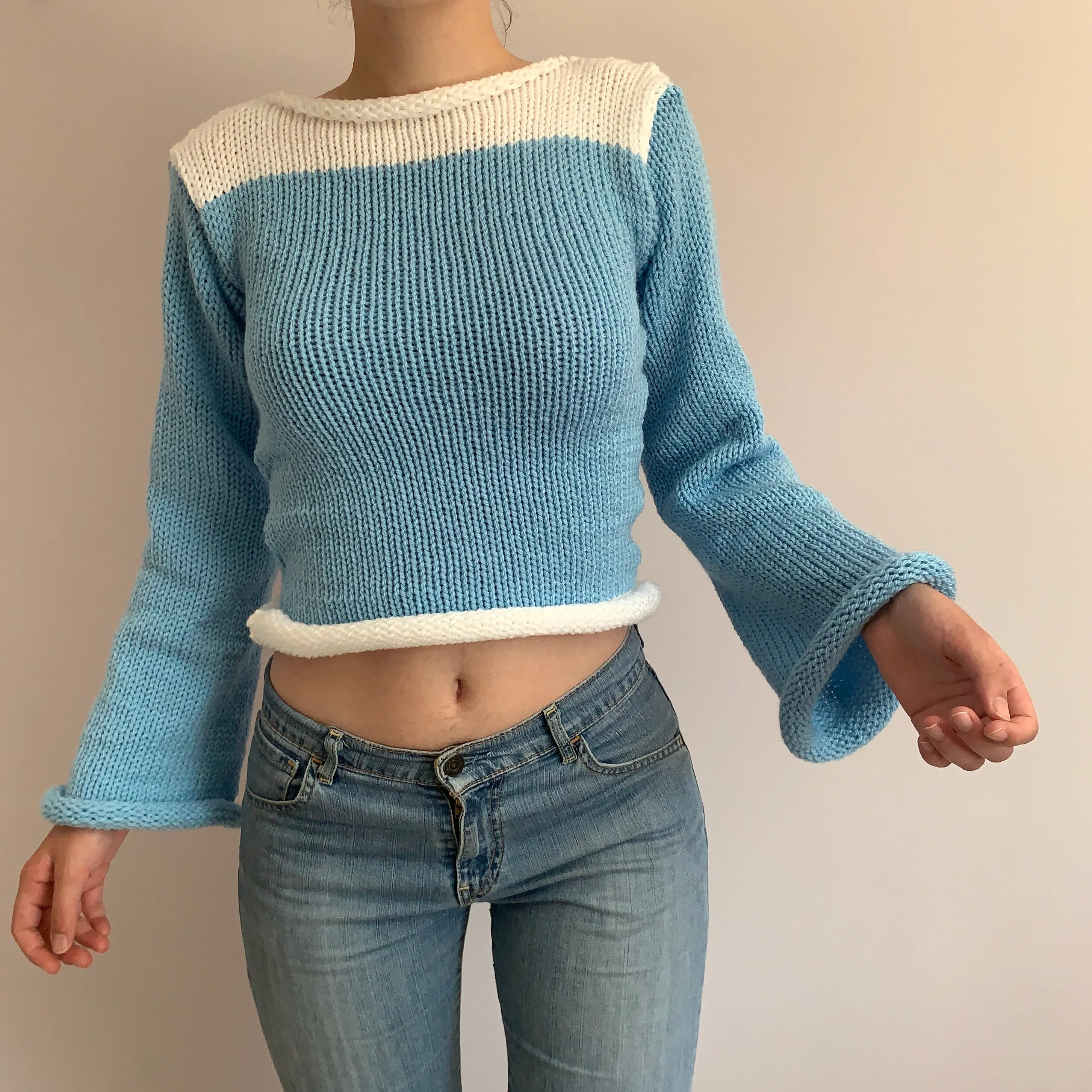 Handmade knitted colour block jumper in baby blue and white