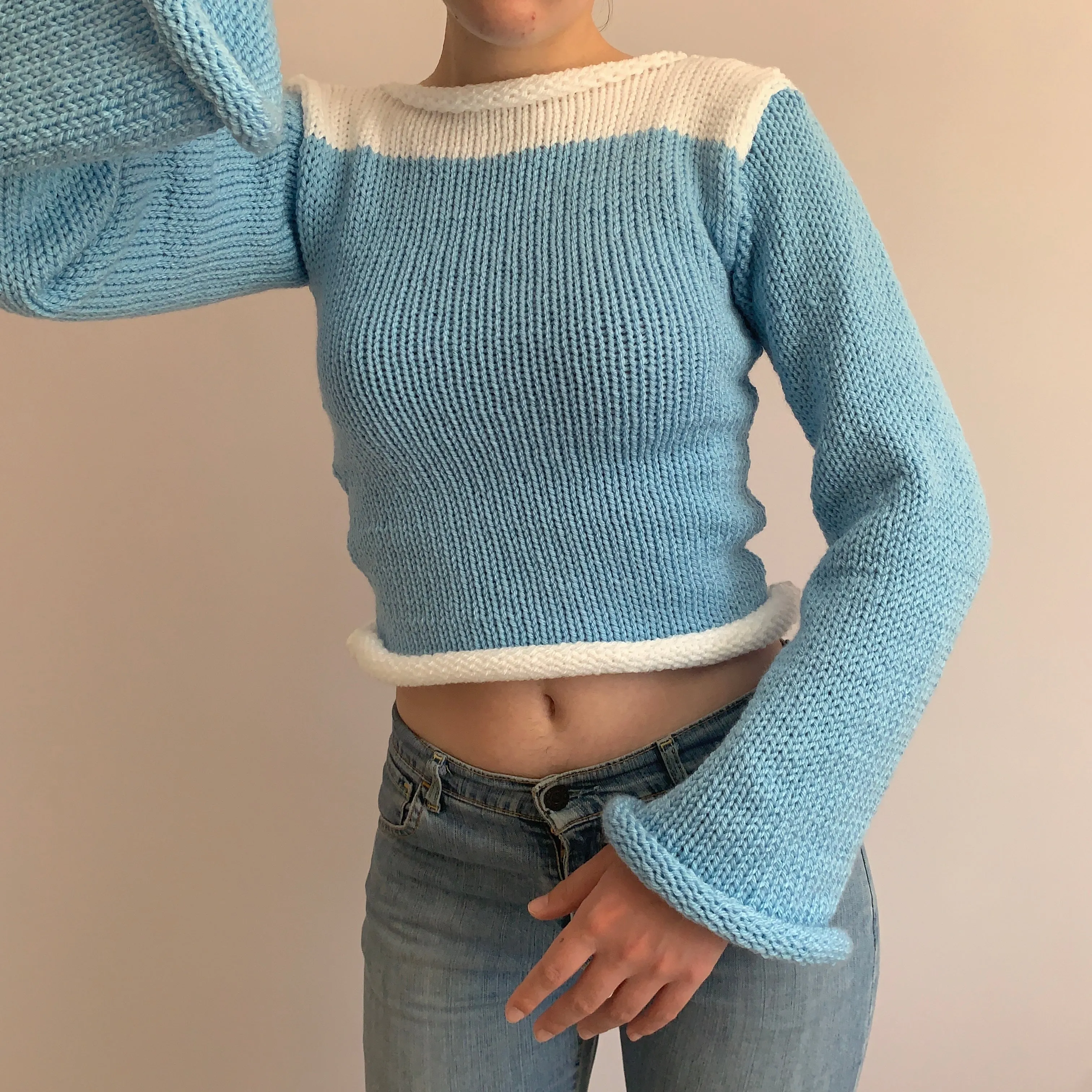 Handmade knitted colour block jumper in baby blue and white