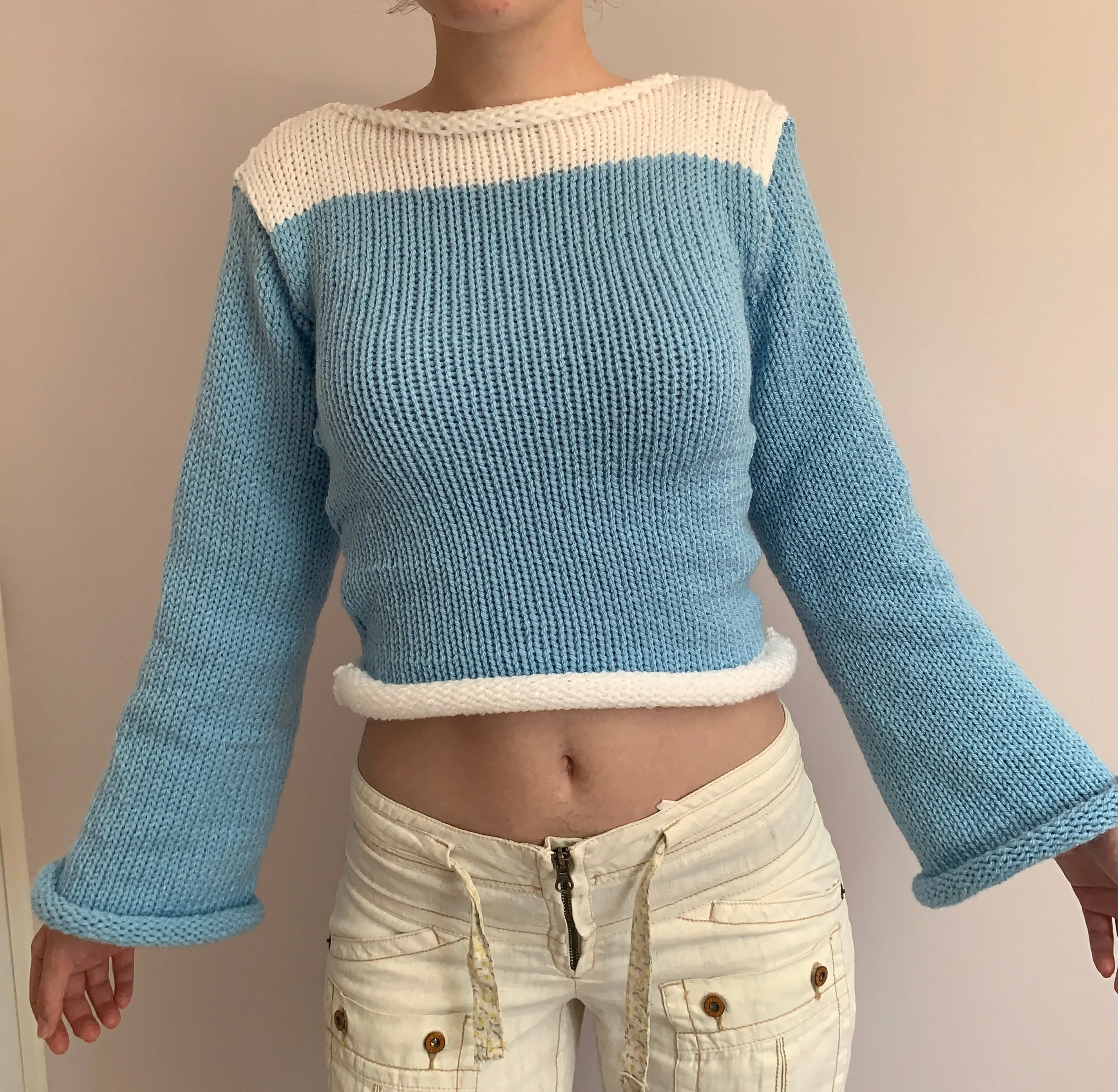 Handmade knitted colour block jumper in baby blue and white