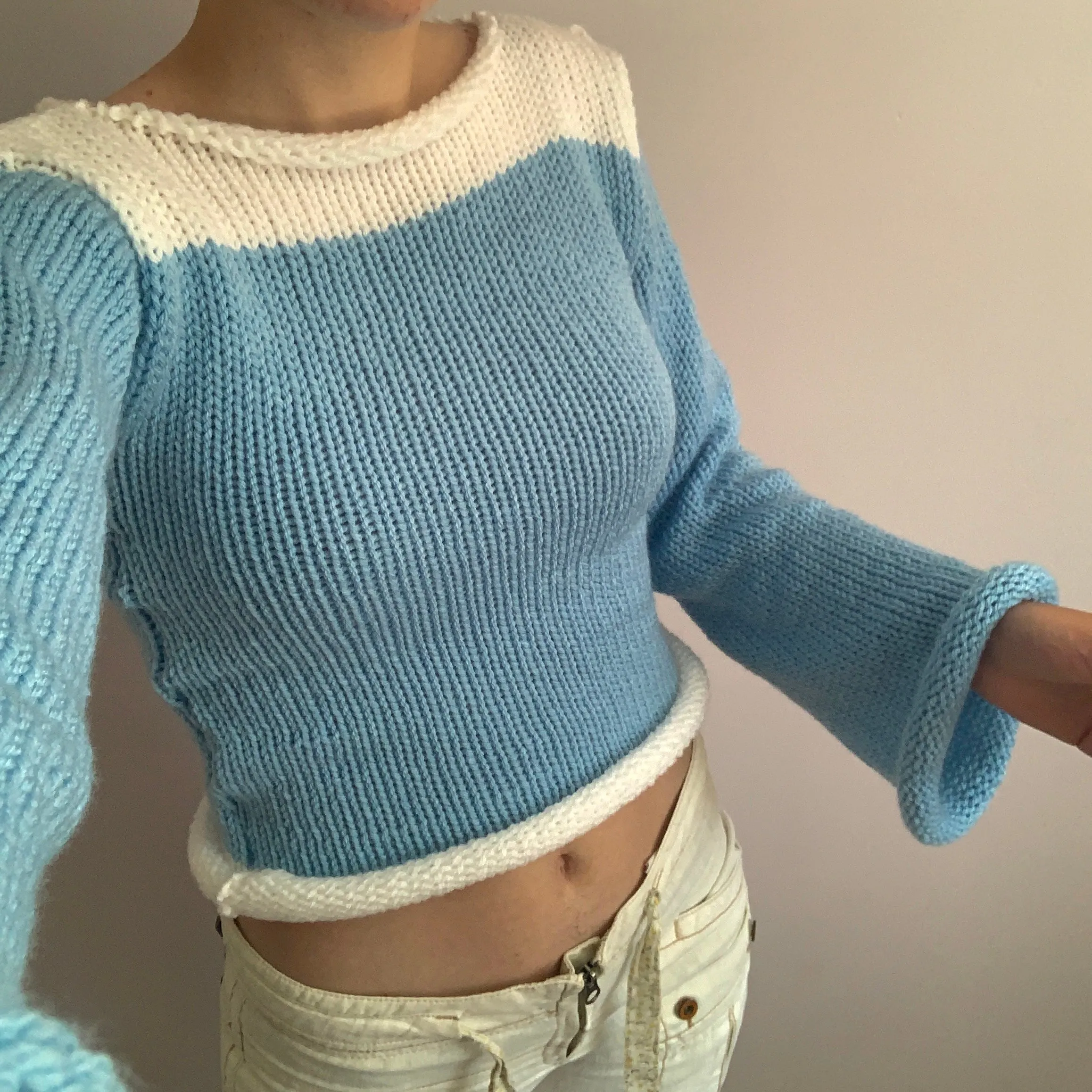 Handmade knitted colour block jumper in baby blue and white