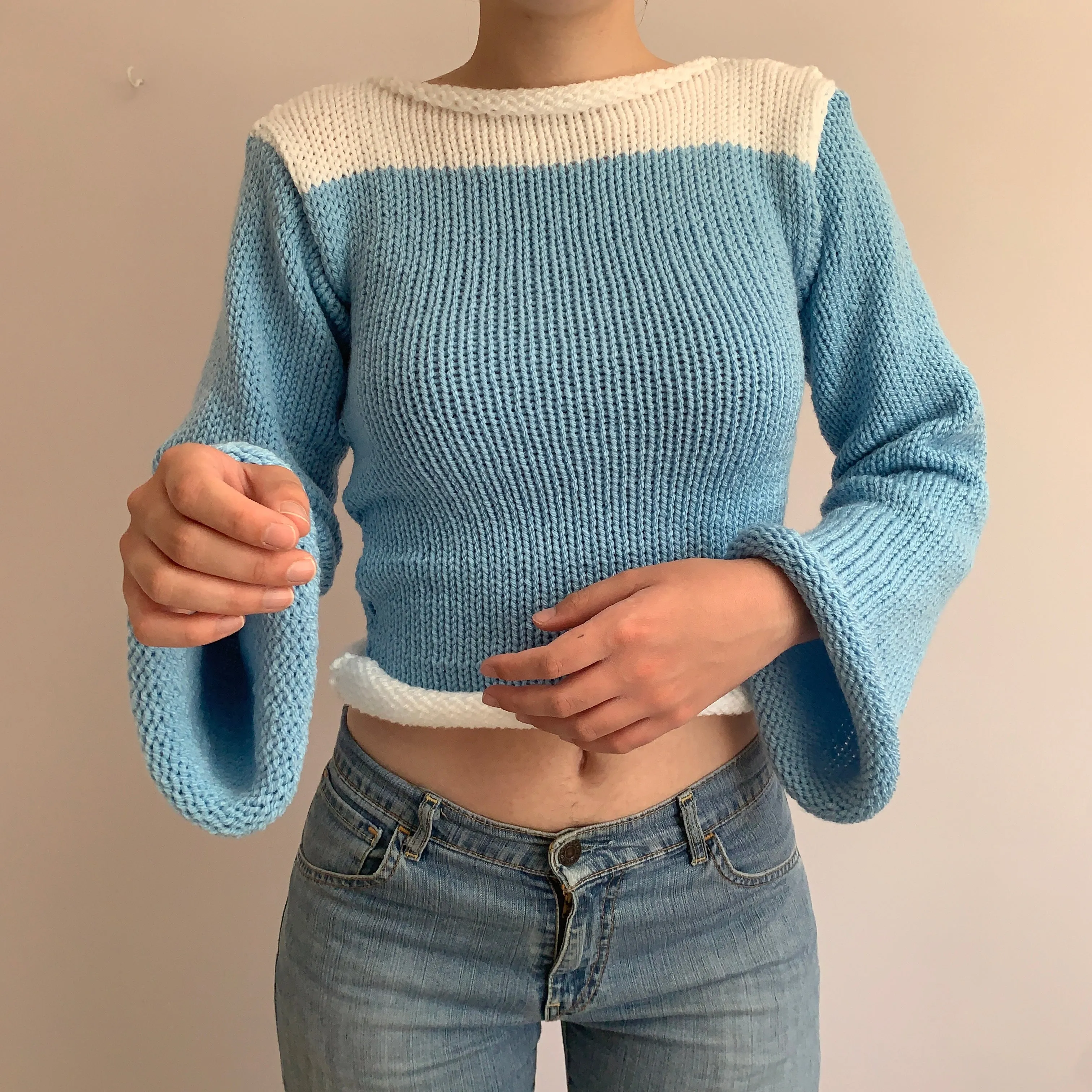 Handmade knitted colour block jumper in baby blue and white